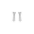 Self-Portrait silver brass earrings featuring a sleek, minimalist design with polished finish and modern style.