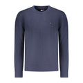 Tommy Hilfiger blue cotton men's sweater with crewneck and long sleeves, casual style, displayed on a hanger.
