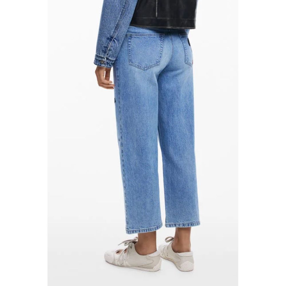 Desigual Azzurro cotton women's jeans featuring a classic fit and light blue denim, displayed on a model.