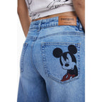 Desigual Azzurro cotton women's jeans featuring a classic fit and light blue denim, displayed on a hanger.