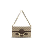 Gucci beige fabric shoulder bag with adjustable strap and subtle logo detailing, stylish accessory for everyday wear.