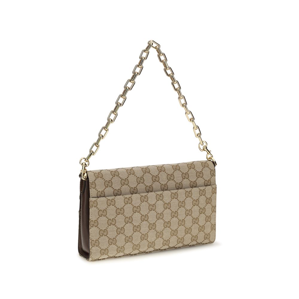 Gucci beige fabric shoulder bag with adjustable strap and subtle logo detail, stylish and versatile for everyday use