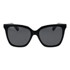 Polaroid black polycarbonate sunglasses with sleek frame and tinted lenses, designed for UV protection and stylish outdoor wear.