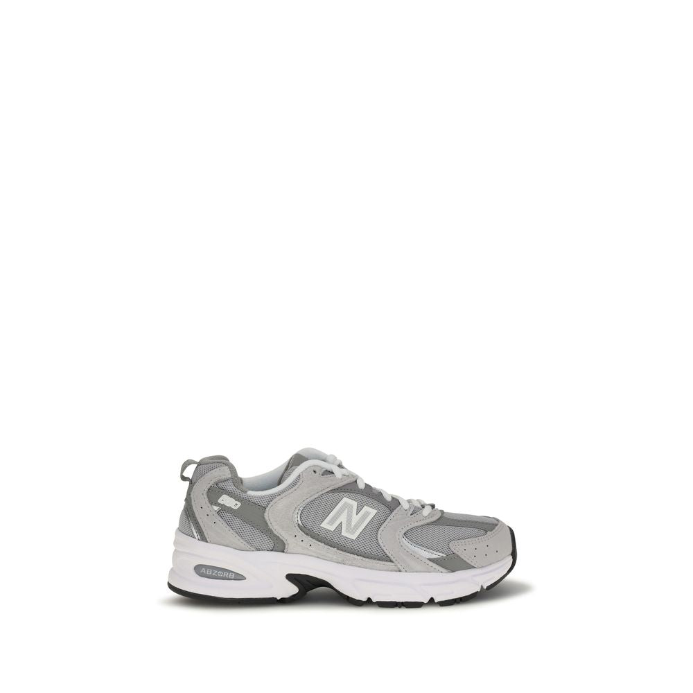 Gray New Balance athletic sneakers made from polyamide fabric, designed for comfort and performance.
