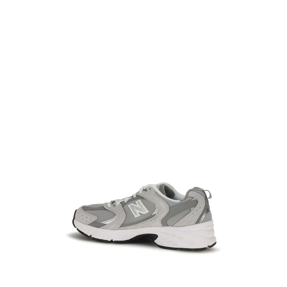 Gray New Balance athletic sneakers made of polyamide with a sleek design and supportive athletic sole.
