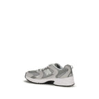 Gray New Balance athletic sneakers made of polyamide with a sleek design and supportive athletic sole.