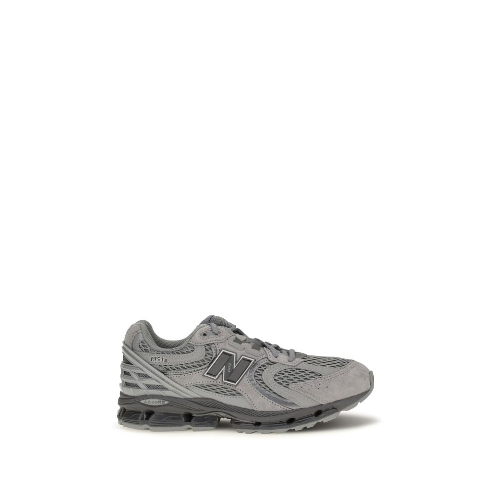 Gray fabric athletic sneakers by New Balance featuring breathable material and supportive design for active wear.
