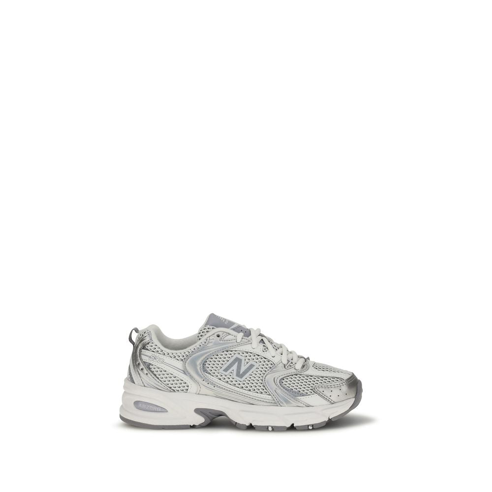 White New Balance athletic sneakers made of polyamide with a sleek design and cushioned sole for active wear.
