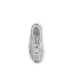 White New Balance athletic sneakers made of polyamide, featuring a sleek design and breathable material for active wear.