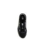 Black New Balance athletic sneakers made of polyamide fabric, featuring a sleek design for active wear and sports activities.