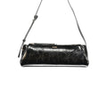 Black Guess Jeans polyurethane women's handbag with sleek design and silver hardware, featuring a top handle and spacious interior.