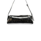Black Guess Jeans women's handbag made of polyurethane, featuring a sleek design and stylish handle, ideal for casual and chic outfits.
