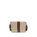 Gucci beige cotton shoulder bag with adjustable strap and subtle logo details, stylish accessory for everyday wear.