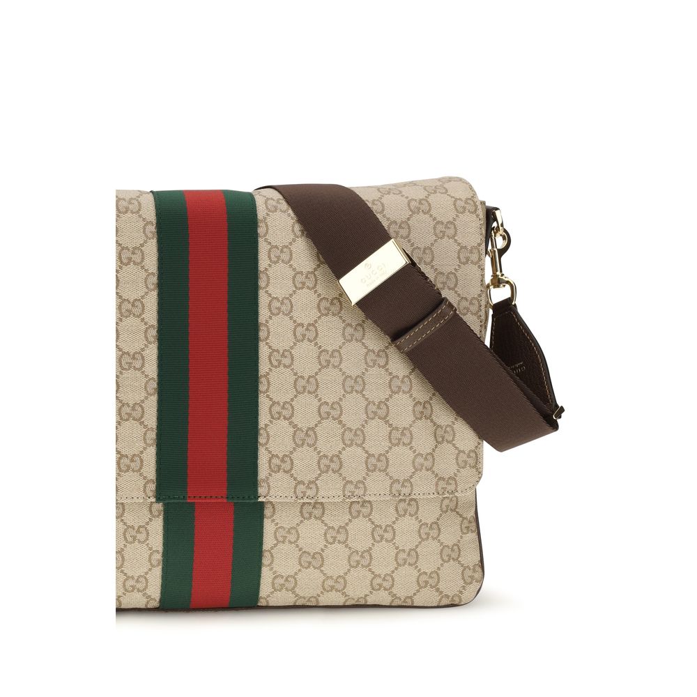 Gucci beige cotton shoulder bag with sleek design and adjustable strap, featuring subtle branding and spacious interior.