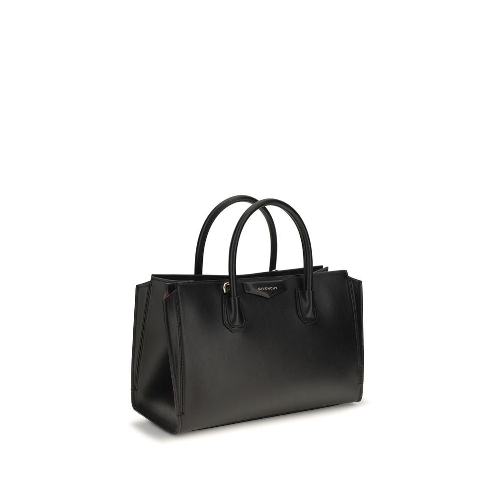 Givenchy black calf leather Bos Taurus handbag with silver hardware and structured design, featuring top handles and a sleek finish.
