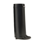 Givenchy black calf leather Bos Taurus ankle boots with sleek design and pointed toes.