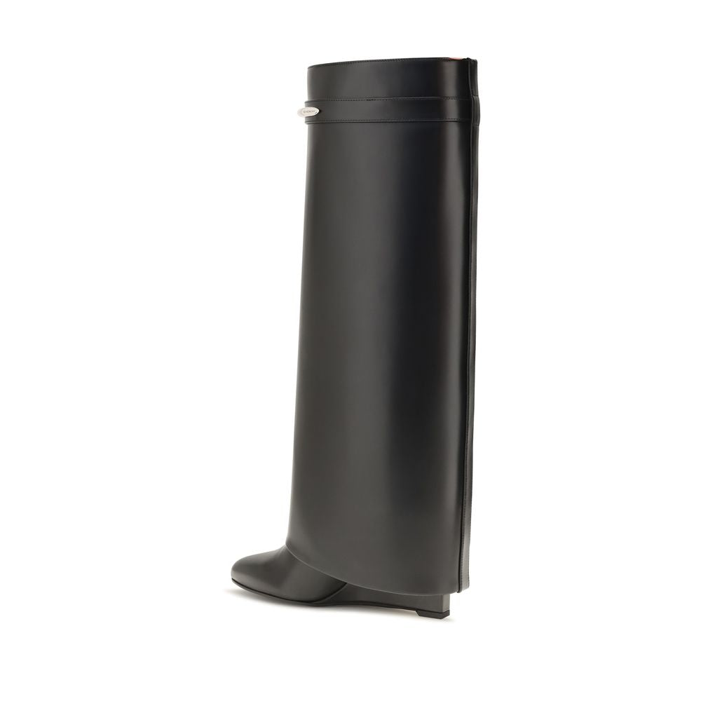 Givenchy black calf leather Bos Taurus ankle boots with sleek design and pointed toe, stylish footwear for women.