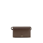 Jil Sander brown calf leather Bos Taurus wallet with sleek design and stitching, featuring multiple card slots and a minimalist style.