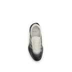 Y-3 black rubber athletic sneakers with sleek design and textured soles, suitable for sports and casual wear.