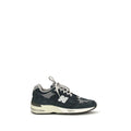 Blue suede leather athletic sneakers by New Balance, featuring a sleek design and comfortable fit.