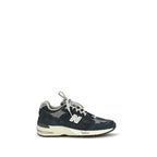 Blue suede leather athletic sneakers by New Balance, featuring a sleek design and comfortable fit.