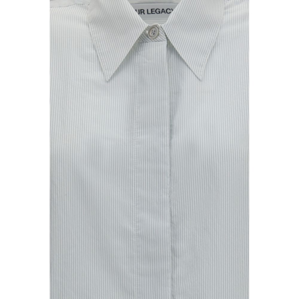 White modal shirt by Our Legacy, featuring a classic fit, button-down front, and soft fabric, displayed on a hanger.
