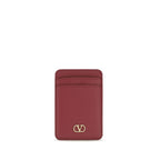 Valentino Garavani Red Calf Leather Bos Taurus Wallet with sleek design and multiple card slots.