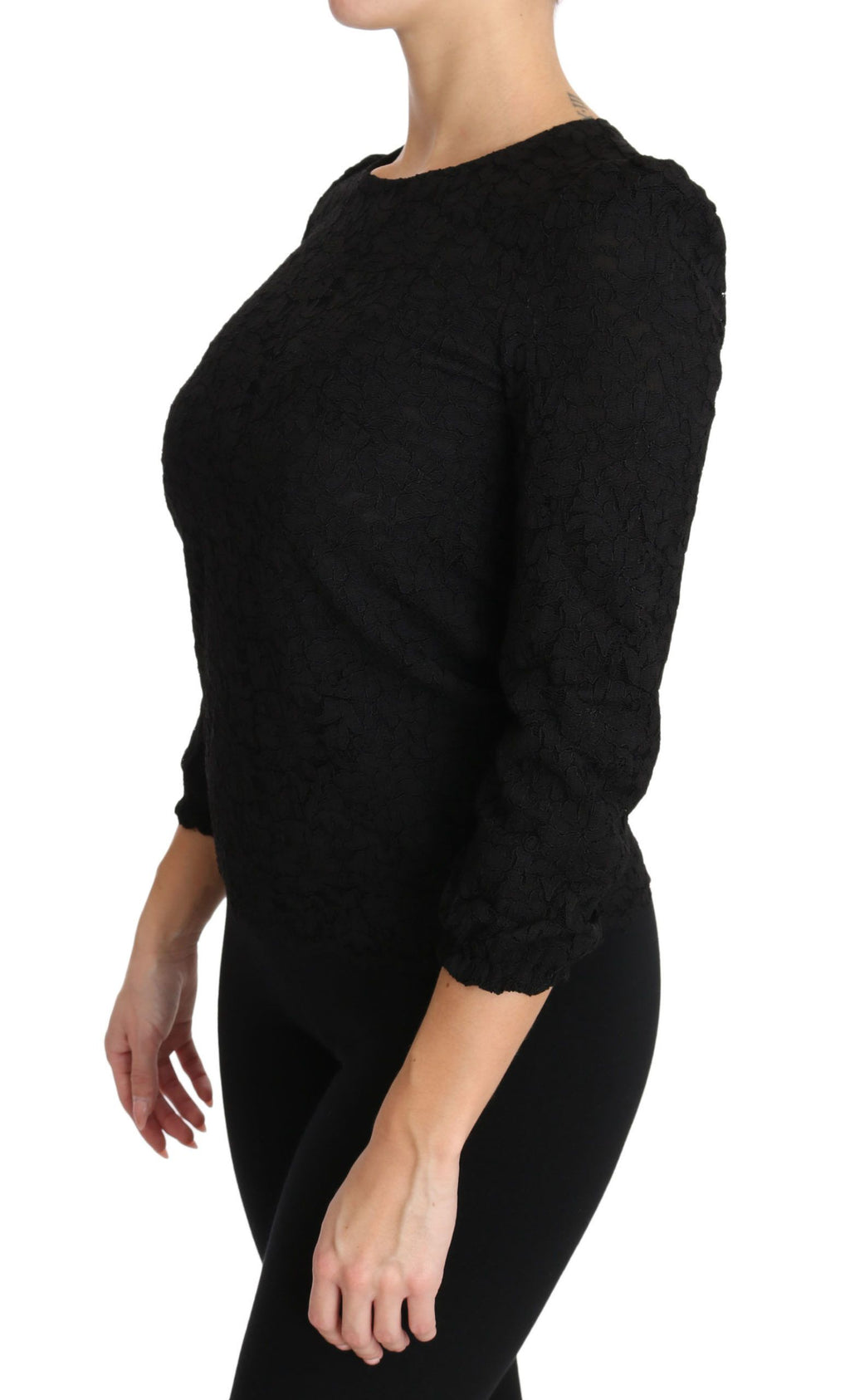 Black floral lace Dolce & Gabbana zipper top blouse with intricate lace details and a stylish fitted design.
