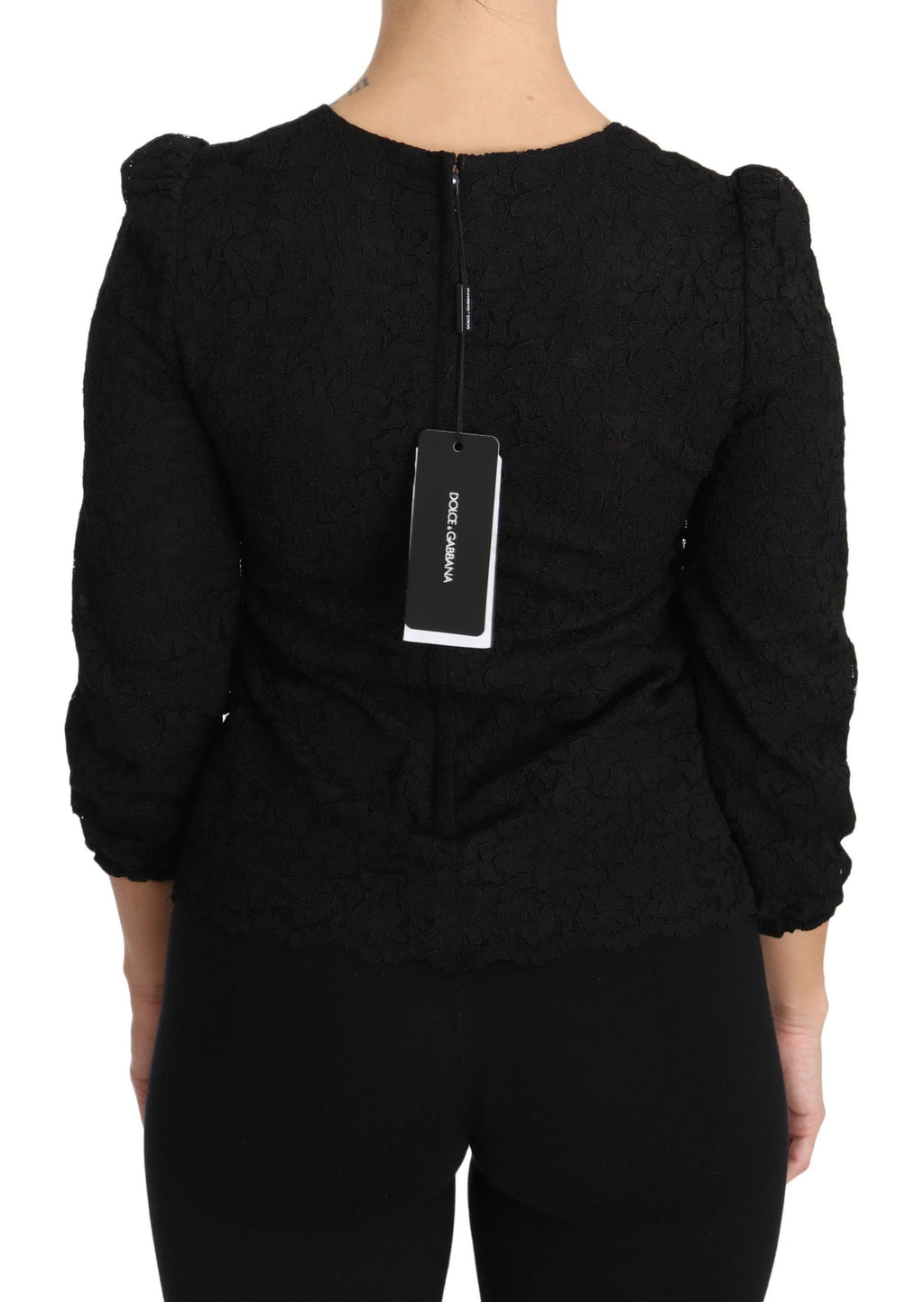 Black floral lace Dolce & Gabbana zipper top blouse with intricate lace details and a sleek fit.