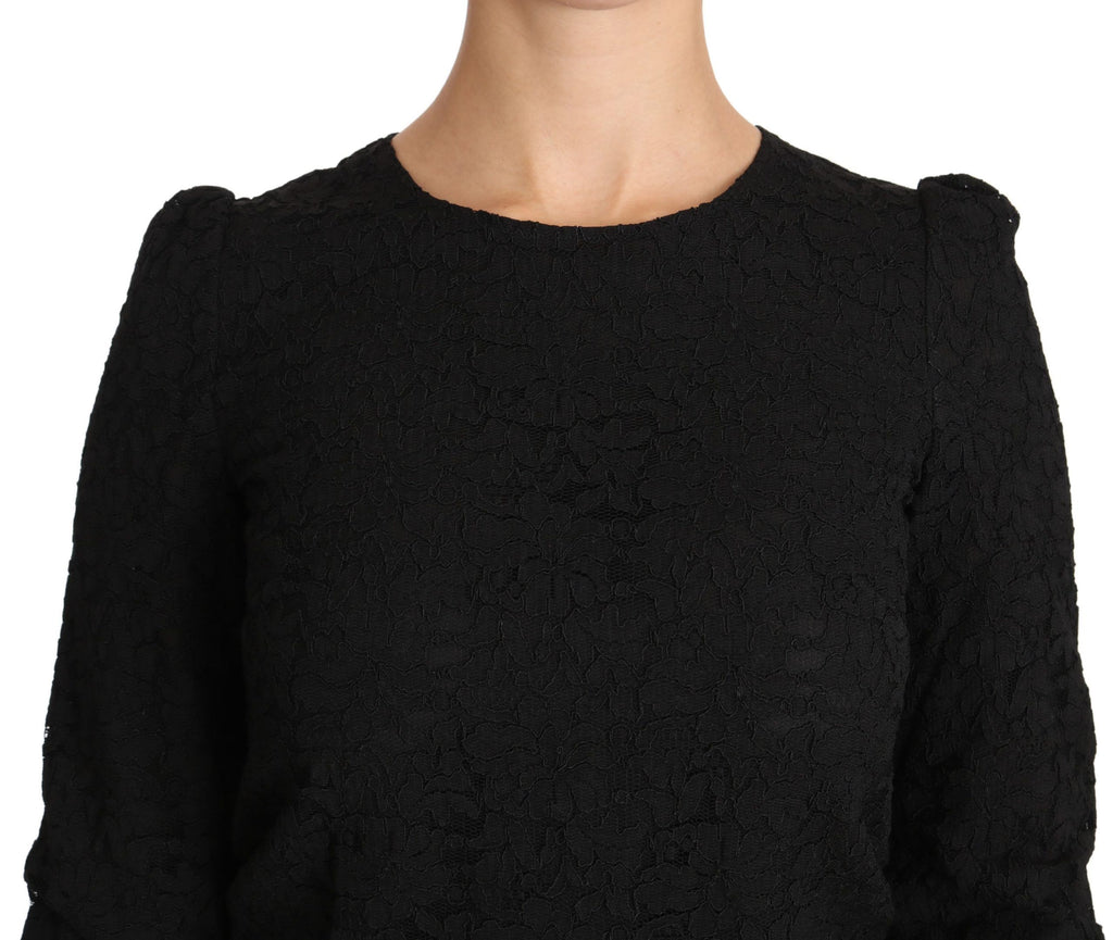 Black floral lace Dolce & Gabbana blouse with zipper detail, stylish top featuring intricate lace patterns and a fitted silhouette.
