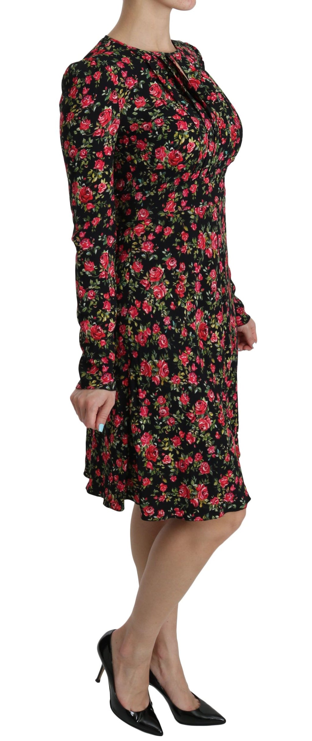 Elegant black floral long-sleeve knee-length dress by Dolce & Gabbana, featuring a fitted silhouette and intricate floral details.