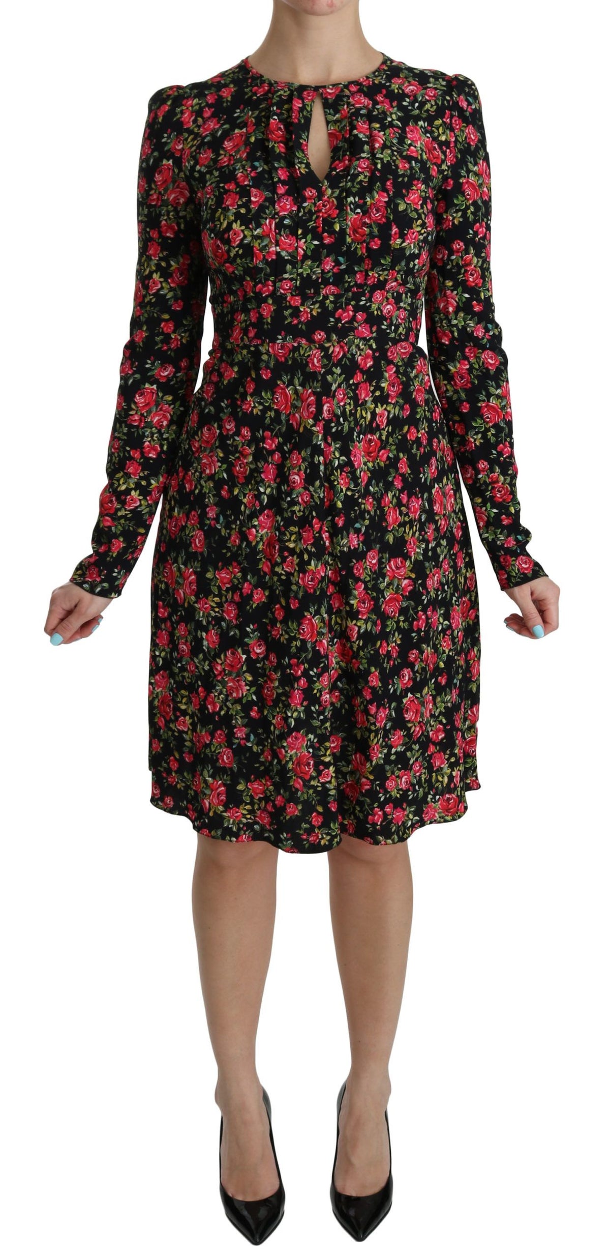 Black floral long-sleeve knee-length dress by Dolce & Gabbana, featuring elegant design and intricate floral patterns.