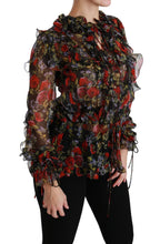 Dolce & Gabbana black floral roses silk blouse with long sleeves and a stylish, elegant design.