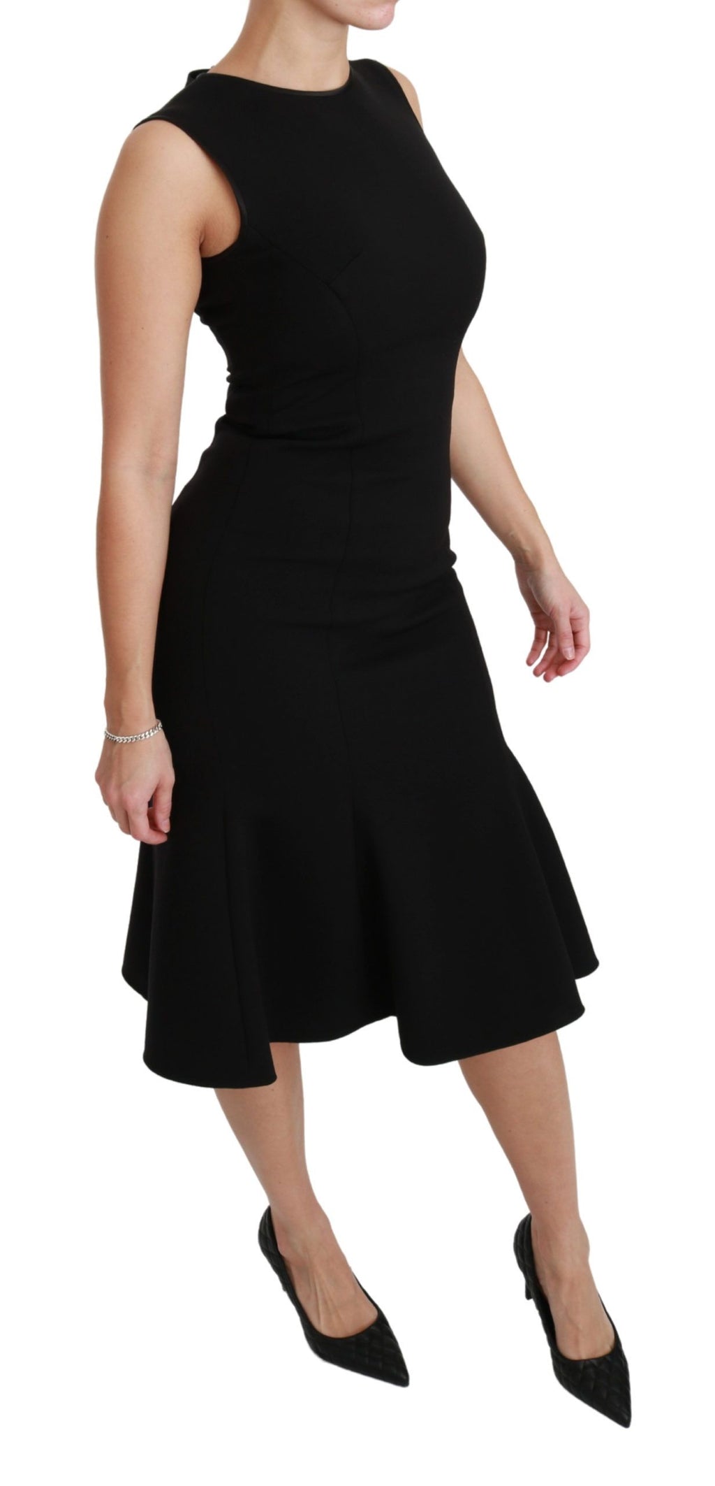 Dolce & Gabbana black fit and flare wool stretch sheath dress displayed on a model, showcasing elegant design and tailored fit.
