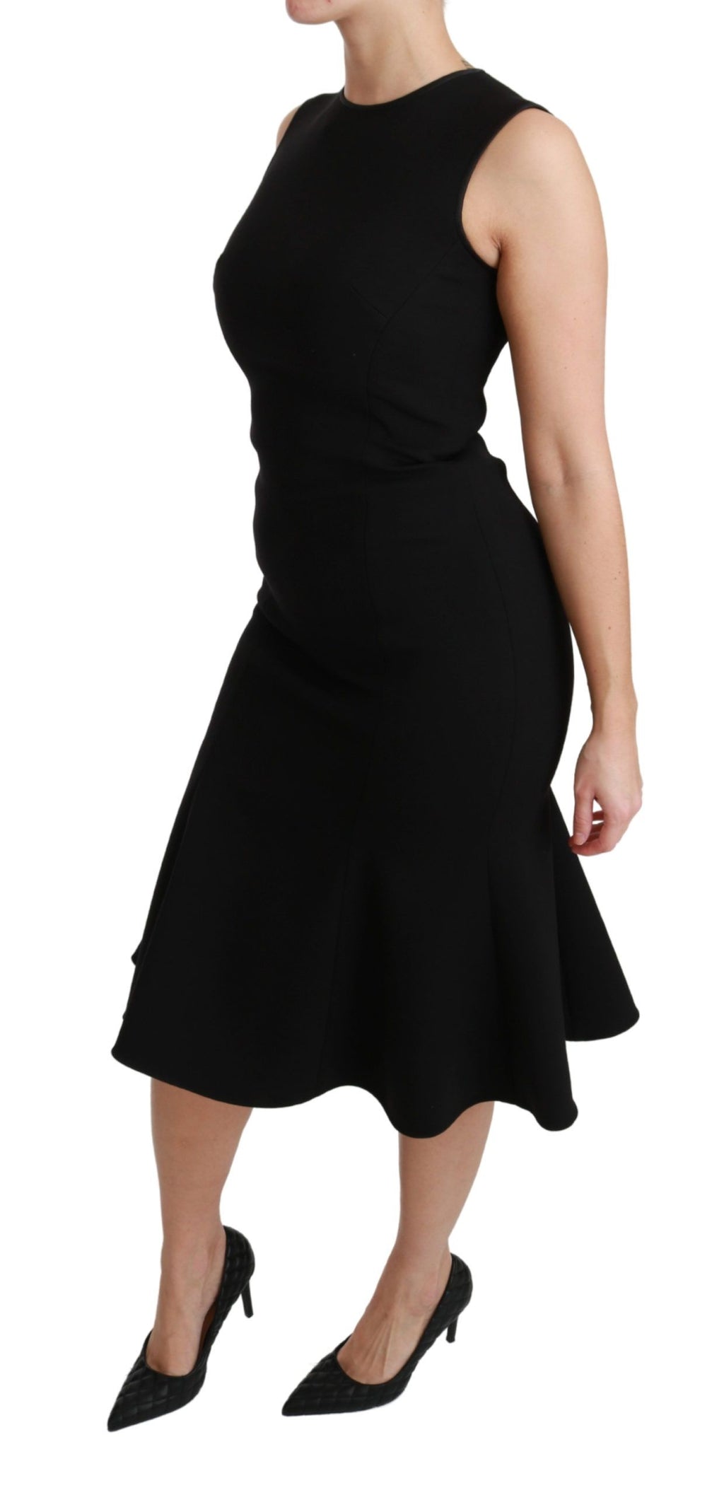 Dolce & Gabbana black fit-and-flare wool stretch sheath dress displayed on a hanger with a smooth background.