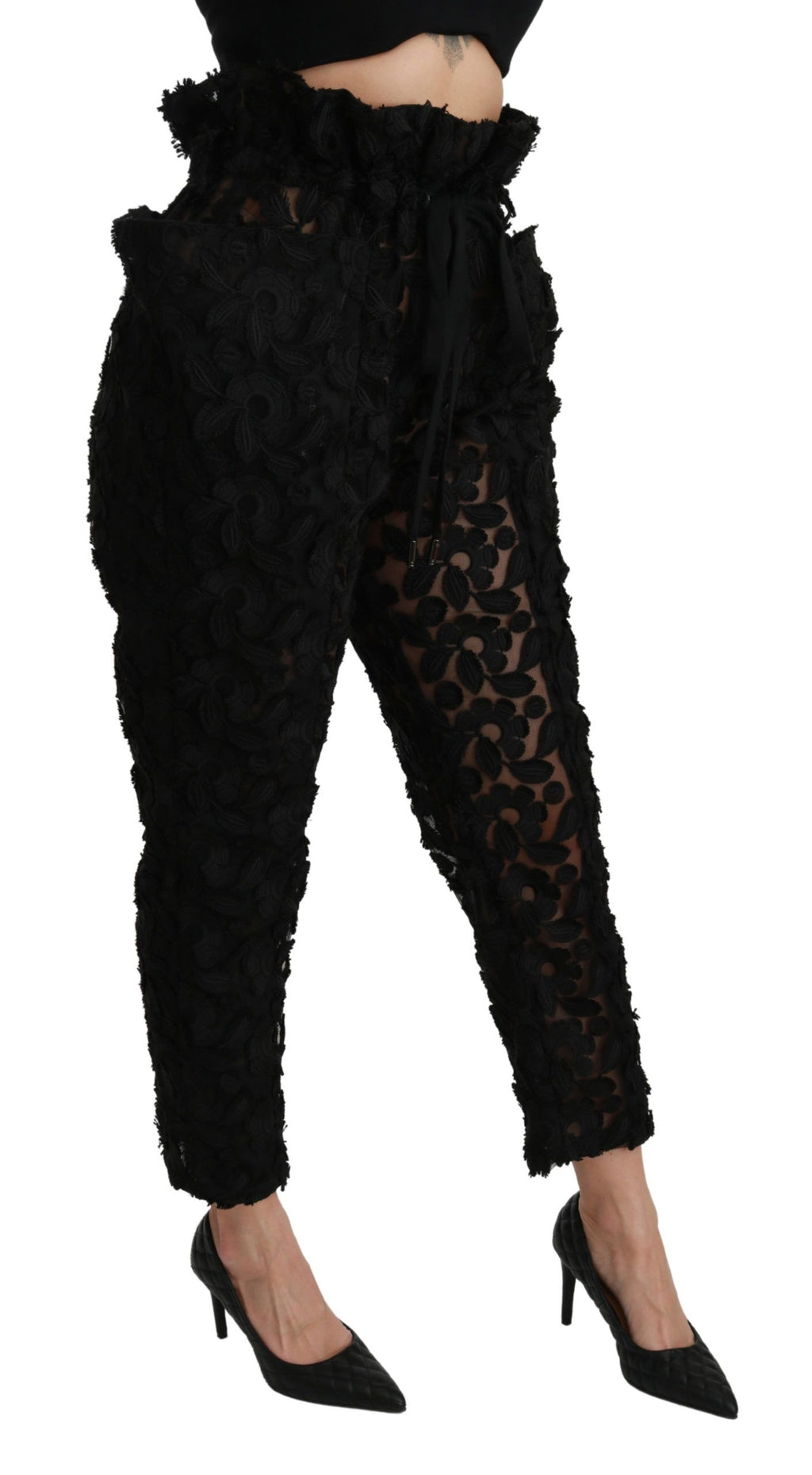 Dolce & Gabbana black floral lace tapered high waist pants with a fitted design and intricate lace detailing.