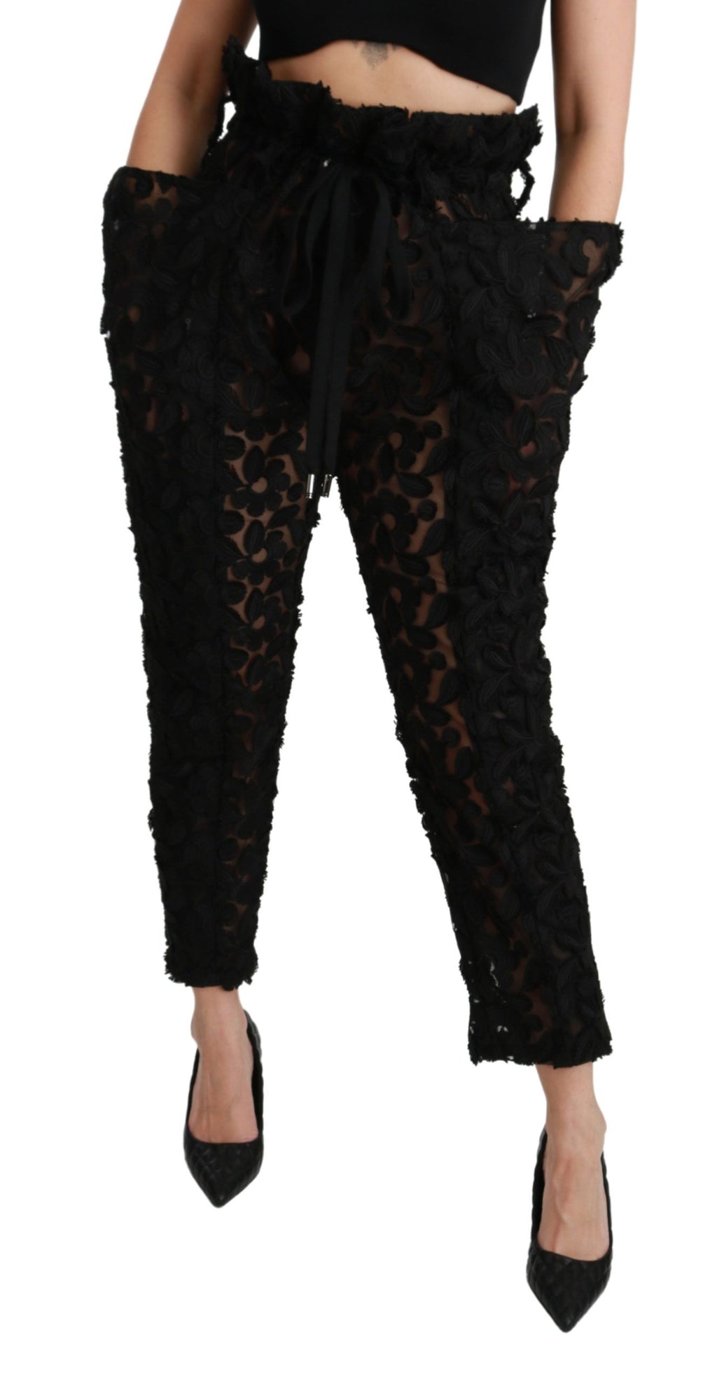 Black floral lace tapered high waist pants by Dolce & Gabbana, featuring intricate lace details and a sleek high-rise fit.