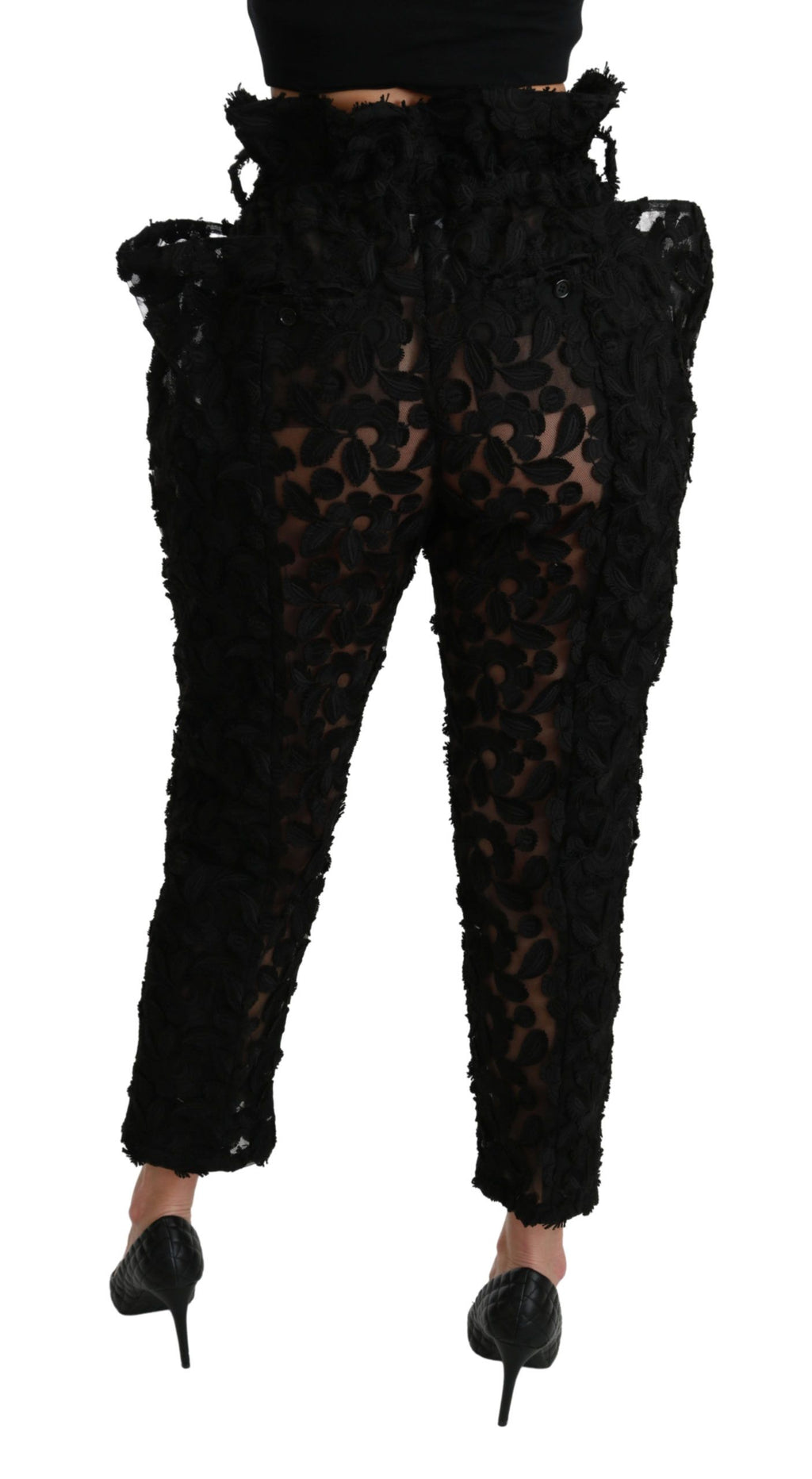Dolce & Gabbana black floral lace tapered high waist pants with a fitted silhouette and intricate lace details.
