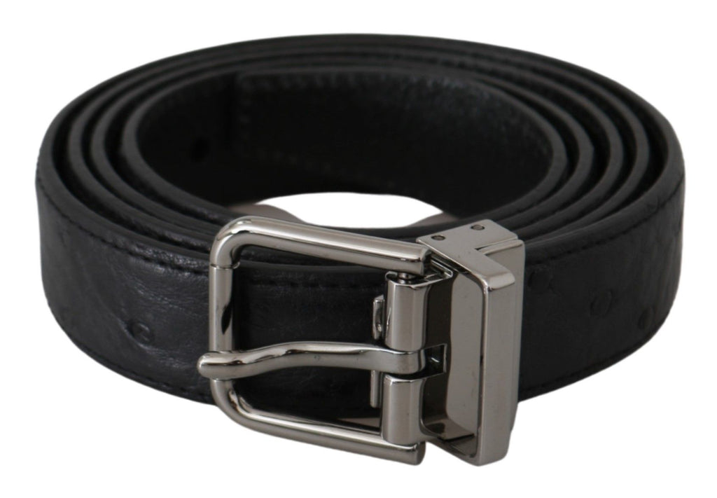 Dolce & Gabbana black exotic skin pattern belt with silver buckle, showcasing luxurious leather and intricate texture.