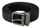 Dolce & Gabbana black exotic skin pattern belt with silver buckle, showcasing luxurious leather and intricate texture.