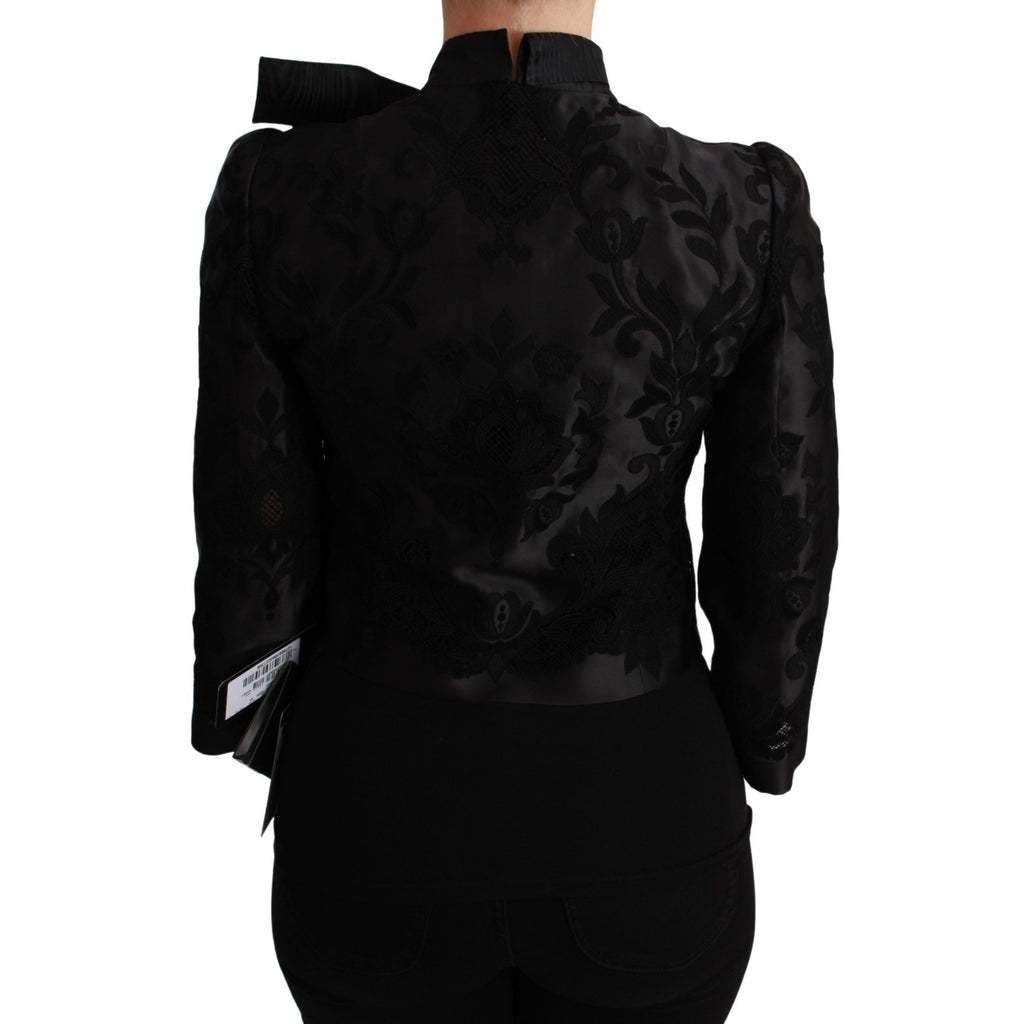 Dolce & Gabbana black floral jacquard blazer silk jacket displayed on a hanger, showcasing elegant floral pattern and tailored fit.