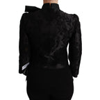 Dolce & Gabbana black floral jacquard blazer silk jacket displayed on a hanger, showcasing elegant floral pattern and tailored fit.