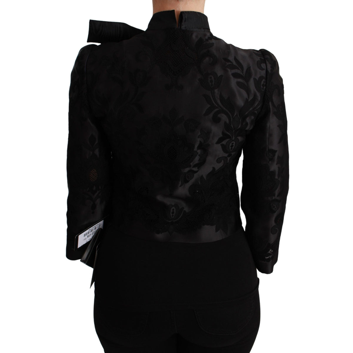 Dolce & Gabbana black floral jacquard blazer silk jacket displayed on a hanger, showcasing elegant floral pattern and tailored fit.