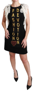 Black Dolce & Gabbana Fashion Devotion sheath mini dress with fitted silhouette and elegant design, shown on a model.