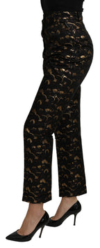 Dolce & Gabbana black and gold brocade high-waist pants with intricate pattern and tailored fit.