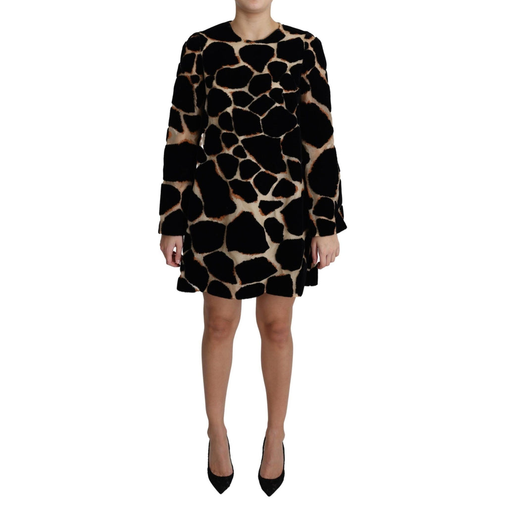 Dolce & Gabbana black giraffe print shift mini dress with short sleeves and fitted silhouette, stylish and eye-catching fashion piece.