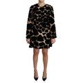 Dolce & Gabbana black giraffe print shift mini dress with short sleeves and fitted silhouette, stylish and eye-catching fashion piece.