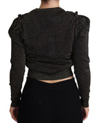 Black Dolce & Gabbana cropped women's pullover sweater with gold accents, featuring a stylish, fitted design and long sleeves.