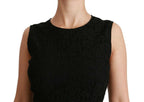 Elegant Dolce & Gabbana black floral lace sheath gown dress displayed on a mannequin, showcasing intricate lace details.