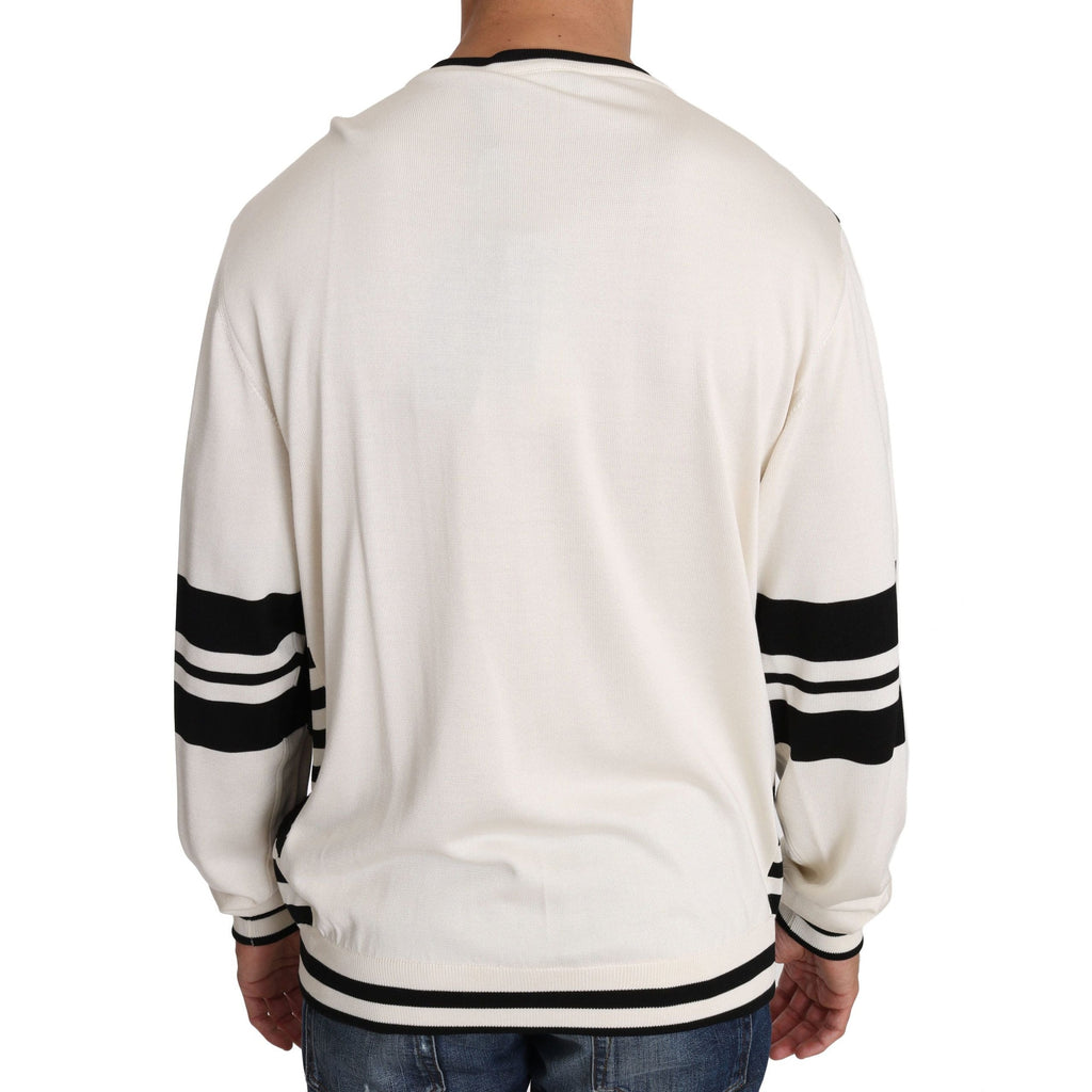 Dolce & Gabbana white jazz sequined guitar pullover sweater with long sleeves and ribbed cuffs, stylish and eye-catching.